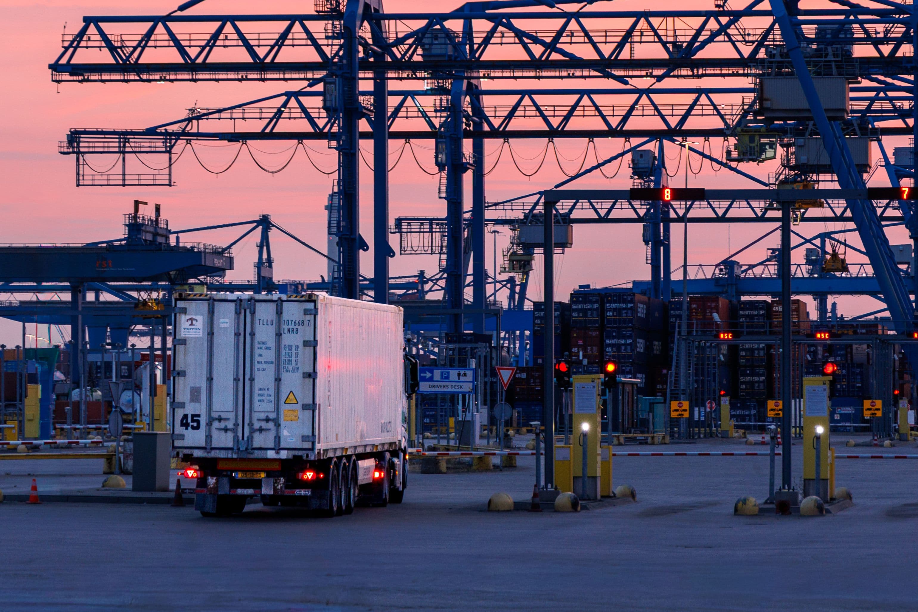 Aerial view of a working port at golden hour.